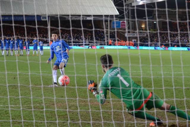 Lee Angol's penalty is saved by West Brom 'keeper Ben Foster. Photo: David Lowndes.