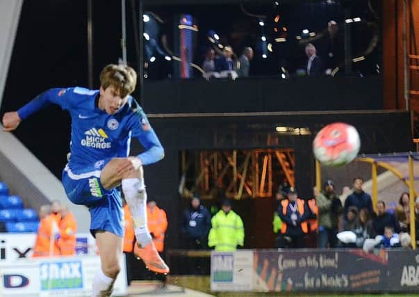 Posh midfdielder Martin Samuelsen shoots at goal. Behind him is the BBC studio that housed live TV host Gary Lineker and his pundits. Photo: David Lowndes.