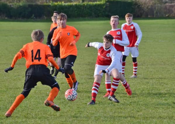 Action from the Under 14 game between Thorney and Oundle, which Oundle won 3-2.