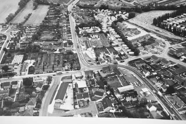 AERIAL VIEW: A great shot of Werrington and the familiar corner near the Cock Inn as Lincoln Road weaves through the village. The picture is not dated but was taken before the Werrington parkway was built.