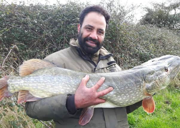 Afzal Din with his 25lb 12oz pike.