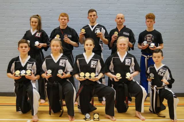 The Peterborough BCKA fighters who did well in the English Championships. From the left are, back, Abi Daulton, Zac Culpin, Leon Gold, Simon Munday, Sam Spencer, front, Eddy Paddock, Chelsea Munday, Jaden Harris, Freya Molloy and Ashton Brannigan.