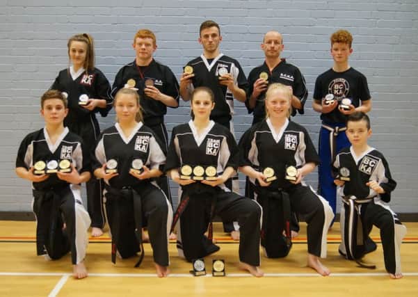 The Peterborough BCKA fighters who did well in the English Championships. From the left are, back, Abi Daulton, Zac Culpin, Leon Gold, Simon Munday, Sam Spencer,  front, Eddy Paddock, Chelsea Munday, Jaden Harris, Freya Molloy and Ashton Brannigan.