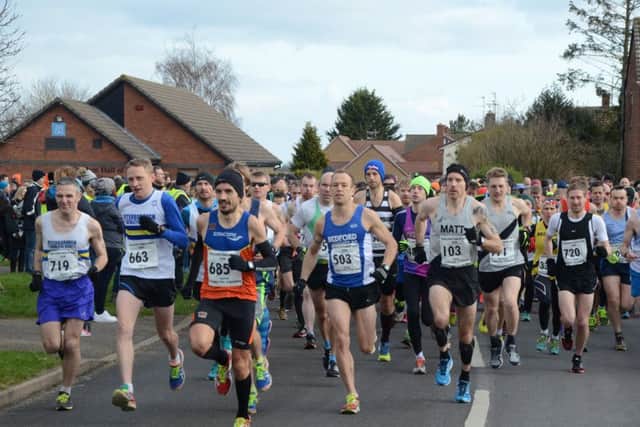 The start of the Stamford Striders 30k race with eventual winner Aaron Scott (685) at the front.