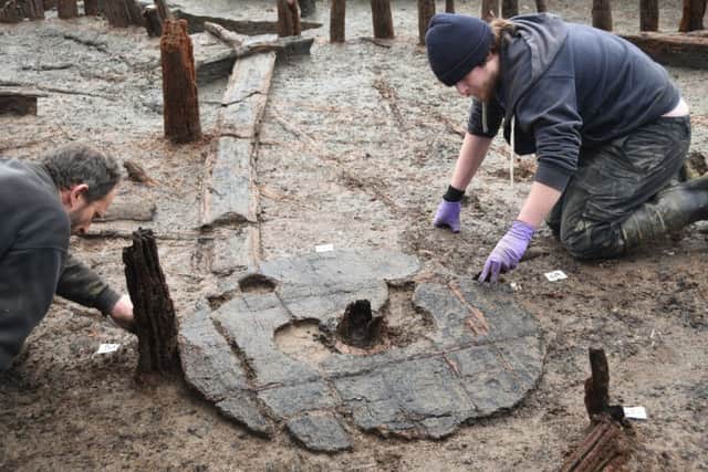 Bronze Age wheel found at Must Farm archaeological dig at Kings Dyke. EMN-160218-133036009