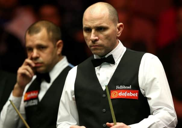 Joe Perry has reached the quarter-finals of the Welsh Open.