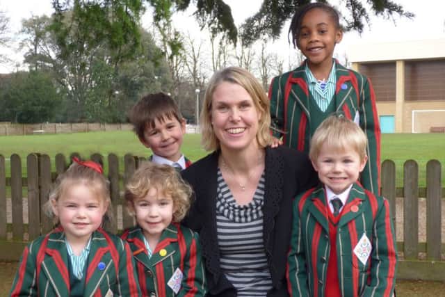 Head of the Prep School and Nursery, Ann-Marie Elding, with pupils.