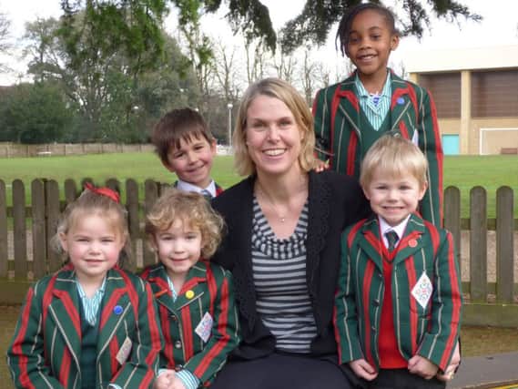 Head of the Prep School and Nursery, Ann-Marie Elding, with pupils.