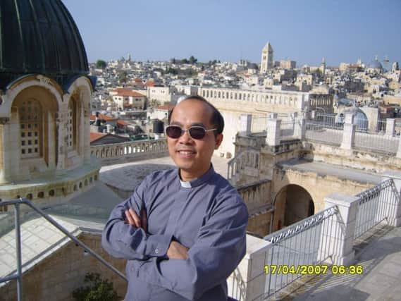 Father John Minh Nguyen on a visit to Jerusalem. Ramallah