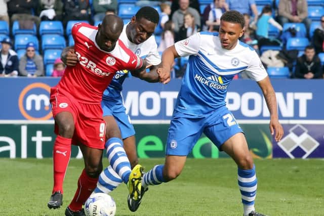 Jonathan Edwards (right) in action for Posh. Photo: Joe Dent/theposh.com.