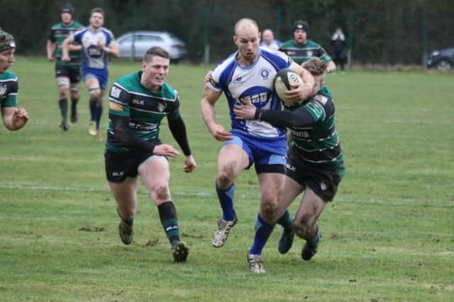 Adam Barnard attacks for the Lions against Scunthorpe. Picture: Mick Sutterby
