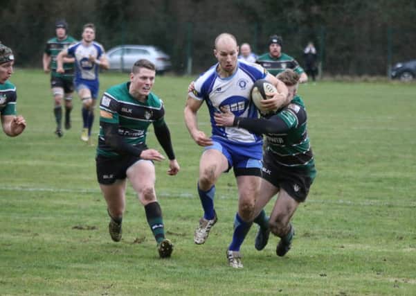 Adam Barnard attacks for the Lions against Scunthorpe. Picture: Mick Sutterby