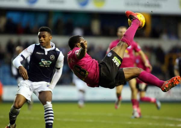 Posh striker Souleymane Coulibaly tries an overhead kick at Millwall. Photo: Joe Dent/theposh.com.