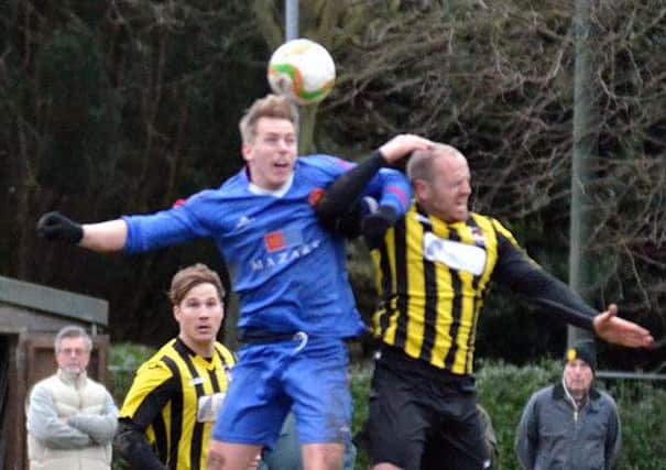Action from Holbeach (stripes) v AFC Kempston in the United Counties Premier Division. Photo: Tim Wilson.