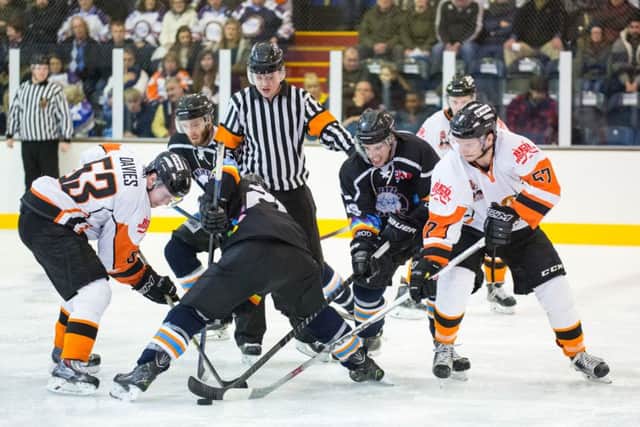 Phantoms Edgars Bebris , Will Weldon and Craig Scott battle for puck possession in the closing moments of the loss to Telford. Picture: Tom Scott