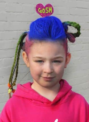 Ellena Sequerah-Salmon takes part in a big hair fundraiser at Burrowmoor Primary School in March to thank Great Ormond Street Hospital for helping to save her life.