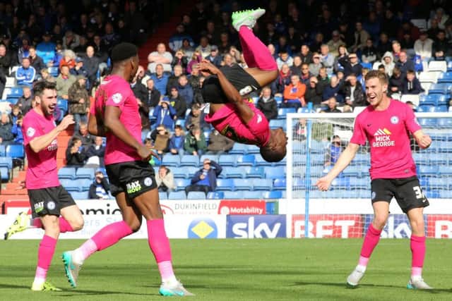 Souleymane Coulibaly celebrates a goal for Posh in a 5-1 win at Oldham. Photo: Joe Dent/theposh.com.