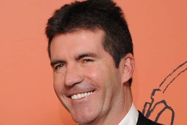 Simon Cowell - Photo credit should read: Ian West/PA Wire