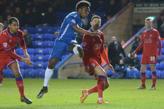 Posh substitute Shaquile Coulthirst shoots wide late in the game against Oldham. Photo: David Lowndes.