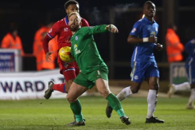 Former Posh skipper Ben Alnwick throws the ball out against Oldham. Photo: Joe Dent/theposh.com.
