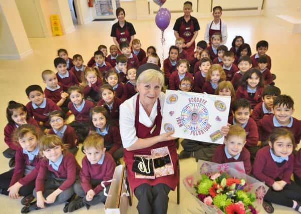 Fulbridge Academy school cook  Anna Monteforte retires after 20 years. Pictured are reception pupils with her EMN-161202-182151009