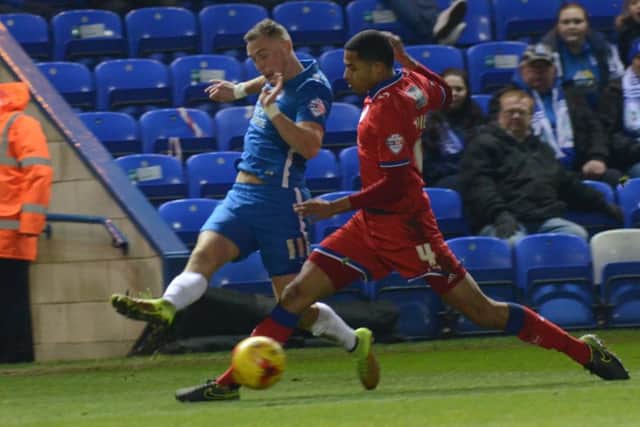 Marcus Maddison in action for Posh against Oldham. Photo: David Lowndes.
