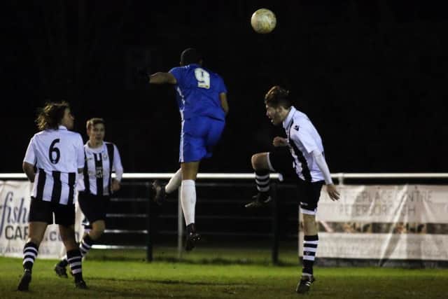 Deon Moore heads Posh in front. Picture: Joe Dent