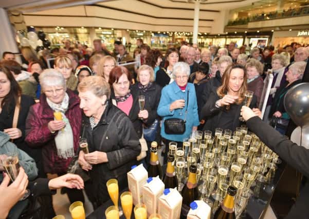 Customers pour into the new look Marks and Spencer store at Queensgate. EMN-160226-122915009