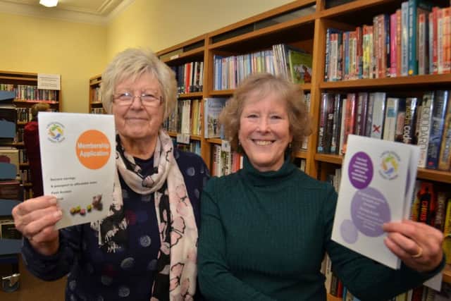 Volunteers 
Sue Newman and Carol Precey of Deepings Credit Union who will be at Deepings Community Library on Wednesday between 11am and 3pm.  Photo by Tim Wilson.