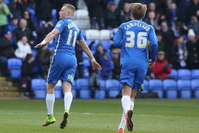 Marcus Maddison celebrates after scoring a penalty for Posh against Swindon. Photo: Joe Dent/theposh.com.