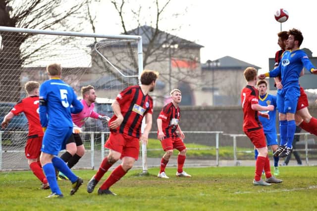 Action from Spalding's 4-0 win over Goole.