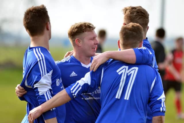 Moulton Harrox celebrate a goal for Joe Townsend in the President's Shield semi-final against Netherton. Photo: Tim Wilson.