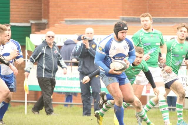 Lions skipper Chris Humphrey on the attack against Sutton Coldfield. Picture: Mick Sutterby