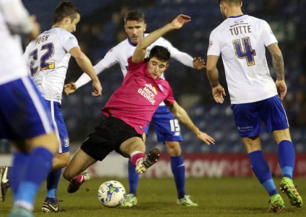 Jack Baldwin of Peterborough United lunges for the ball. Picture: Joe Dent