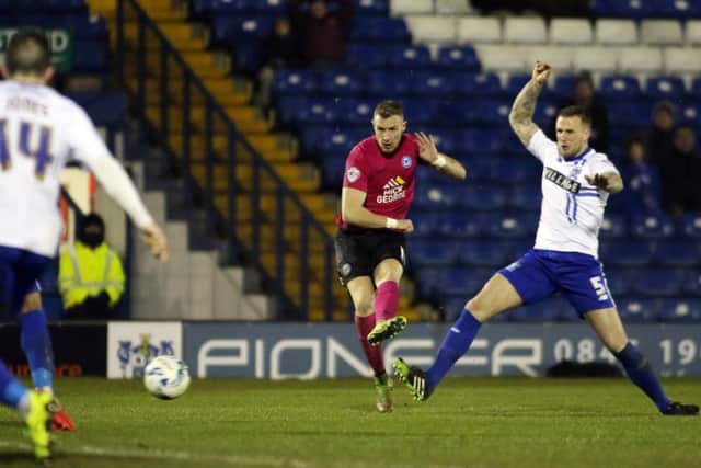 Marcus Maddison of Peterborough United scores his side's only goal of the game. Picture: Joe Dent
