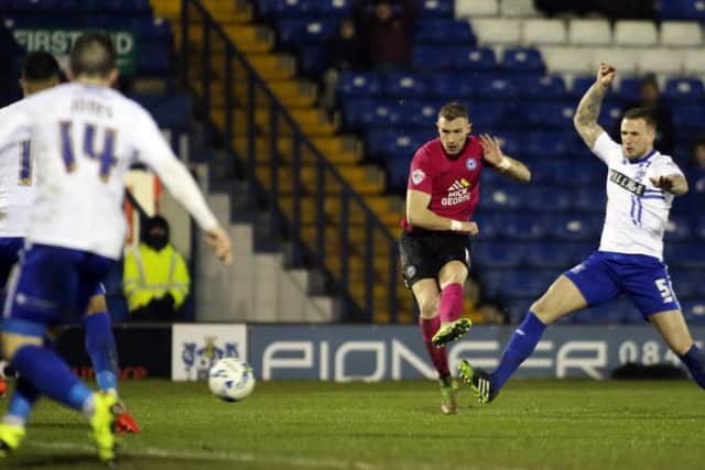 Marcus Maddison scores for Posh at Bury. Photo: Joe Dent/theposh.com.