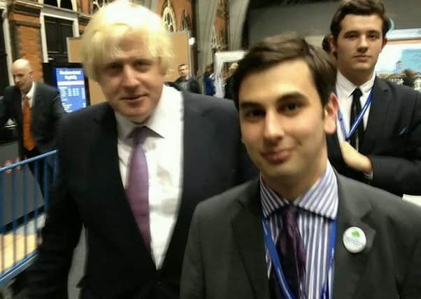 Elliot Johnson the young Conservative activist who killed himself after allegedly being bullied - Pictured with Boris Johnson in 2014. ANL-160403-165632001