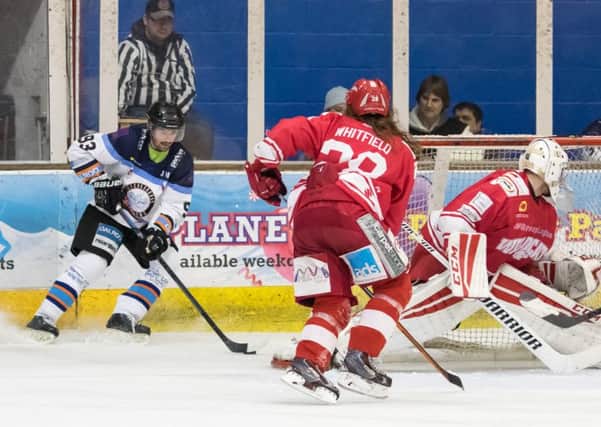 Man-of-the-match Ales Padelek controls the puck behind the Swindon net. Picture: Tom Scott