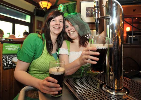 St Patrick's Day is celebrated in O'Neills pub on Broadway ENGEMN00120120317183205