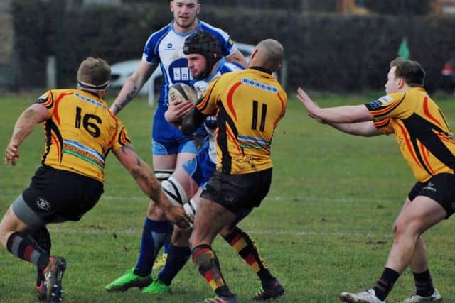 Conor Gracey tries to make ground for the Lions. Picture: Kevin Goodacre