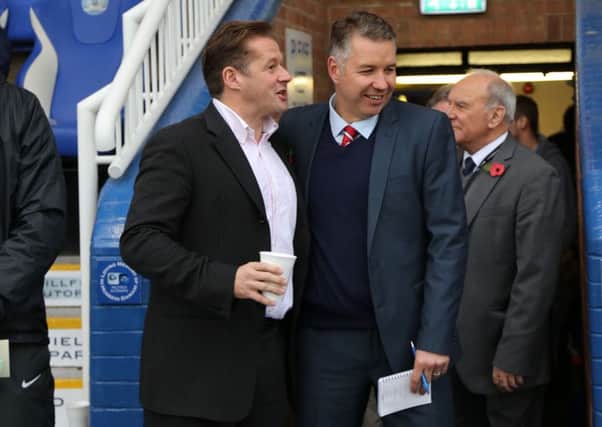 Rival managers Graham Westley (left) of Posh and Darren Ferguson of Doncaster.