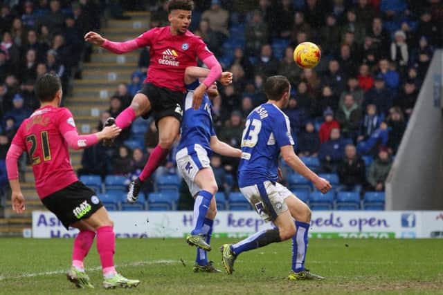 Lee Angol could be back for Posh against Port Vale.