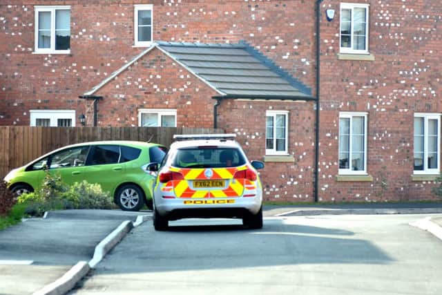 A police car was parked in a nearby street, Tyne Close, at around 2.30pm today (Friday). SG110316-104TW