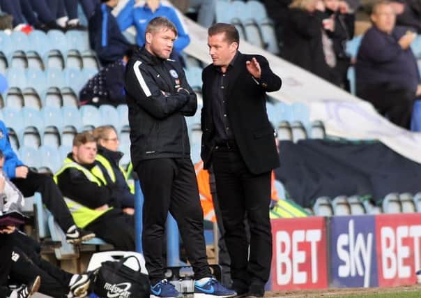 Posh manager Graham Westley and his assistant Grant McCann talking tactics during the Port Vale match. Photo: Joe Dent/theposh.com.