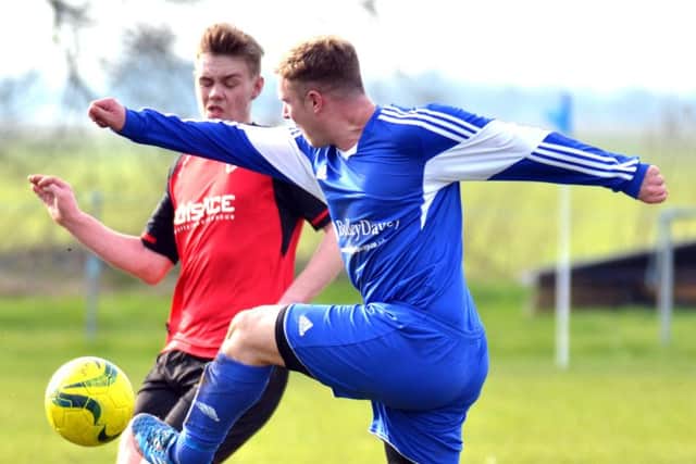Joe Townsend scored twice for Moulton Harrox at Thorney.