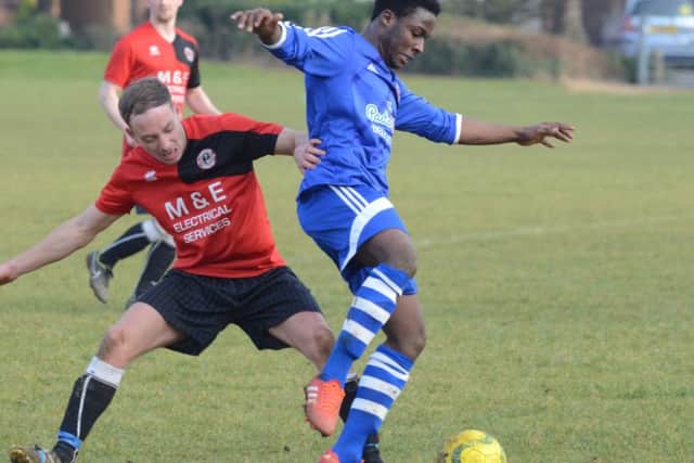 Action from ICA Sports Reserves v Stamford Lions (red). Photo: David Lowndes.
