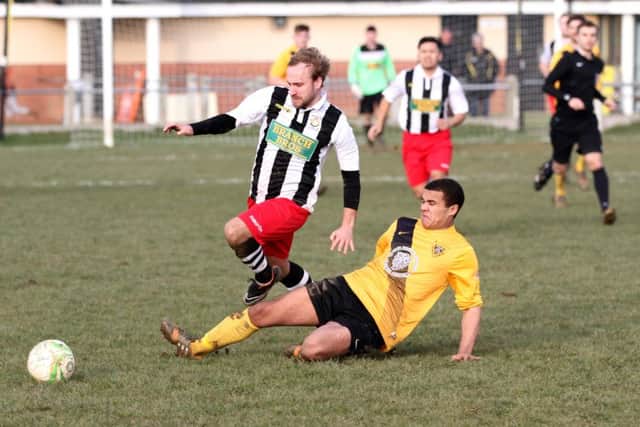 Chris Jones of Peterborough Northern Star rides a challenge in the weekend defeat at Harborough Town. Photo: Tim Gates.