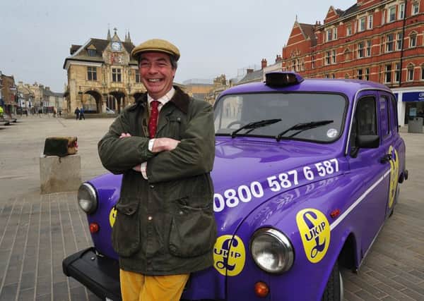 Nigel Farage campaigning for UKIP in Peterborough City Centre ENGEMN00120131004160941