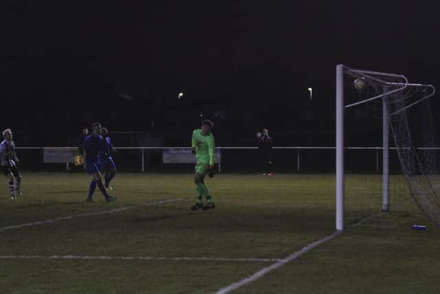 Craig Smith scores his second goal for Peterborough Northern Star against Stotfold. Photo: Tim Gates.