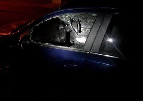 The damged car which was broken into in Humphreys Street hXudwWVPmRGjrD7i4RIK